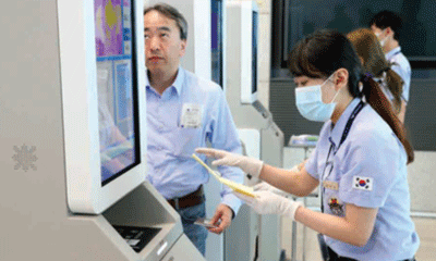 Photographs using an infectious disease preparedness system at the airport
        